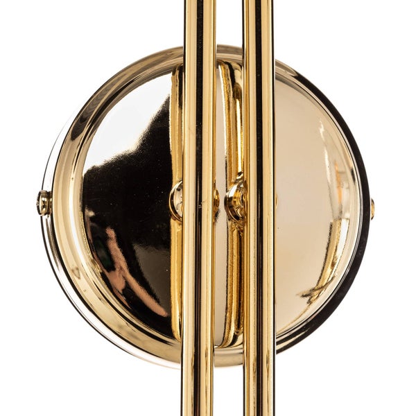 Detailaufnahme einer goldenen Lampe zur Wandmontage