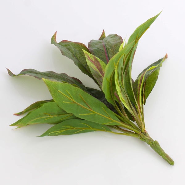 Künstlicher Pflanzenzweig mit grünen Blättern und rötlicher Musterung.