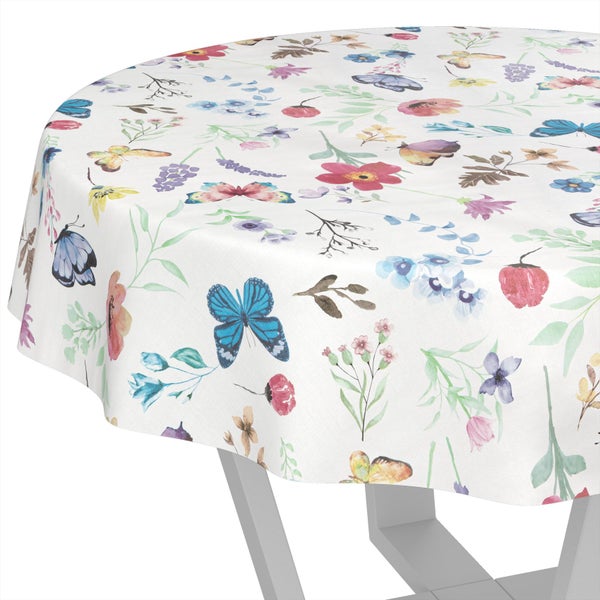 Runde Tischdecke mit bunten Blumen und Schmetterlingen im Aquarell-Stil auf einem Tisch drapiert.