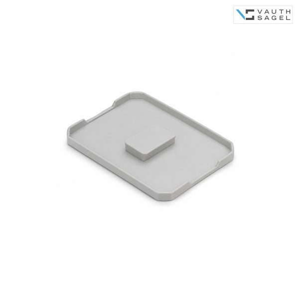 Vauth Sagel Logo. Graue flache Kunststoffschale mit erhöhter Mitte.