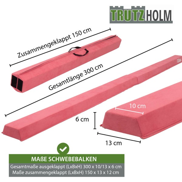 Kind balanciert auf rosa Schwebebalken aus Vliesstoff in hellem, geordnetem Raum. Balken ist 6 Zentimeter hoch und 10 Zentimeter breit.