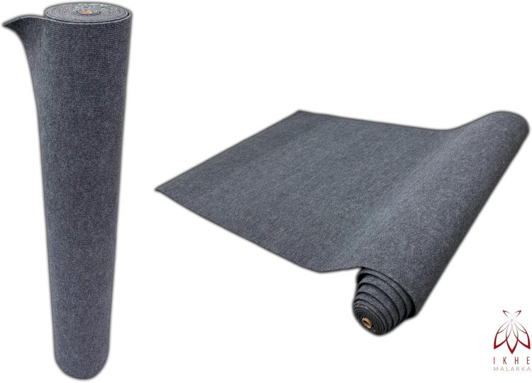 Grauer Teppich als Rolle und ausgerollt