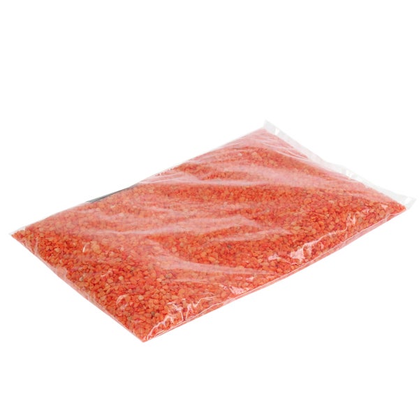 Transparenter Beutel mit orangefarbenem Dekokies für Garten und Innenbereiche.