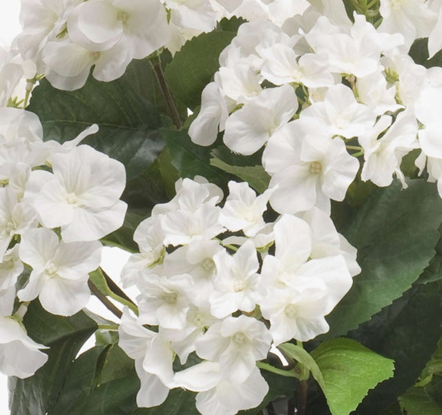 Künstliches Löwenmäulchen mit pink-gelben Blüten an einem grünen Stiel für die Innendekoration.