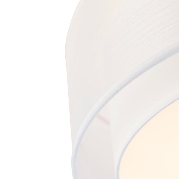 Nahaufnahme eines lichtdurchlässigen Lampenschirms mit feiner Rillenstruktur.