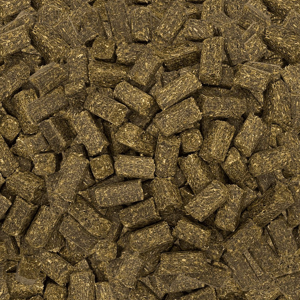 Eine Ansammlung von gepressten Strohpellets aus organischer Biomasse