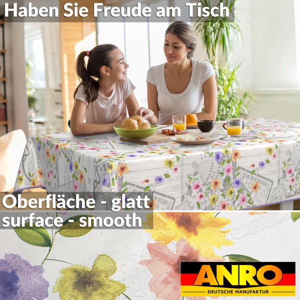Tischdecke mit Blumenmuster, zwei Personen am Tisch und ANRO Logo