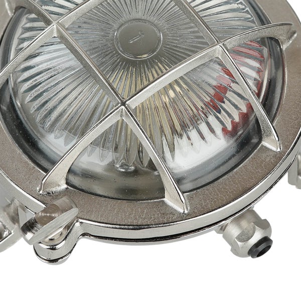 Detailansicht einer runden Deckenleuchte mit Metallgitter und Glasabdeckung.