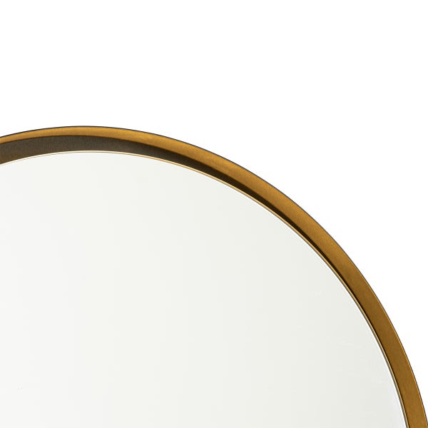 Detailaufnahme eines runden Spiegels mit Rahmen