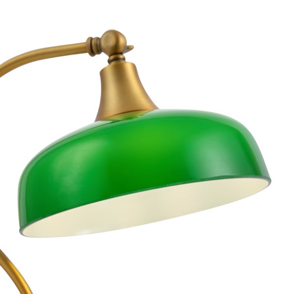 Grüner Lampenschirm einer Schreibtischleuchte im Banker-Stil mit messingfarbenem Gestell.