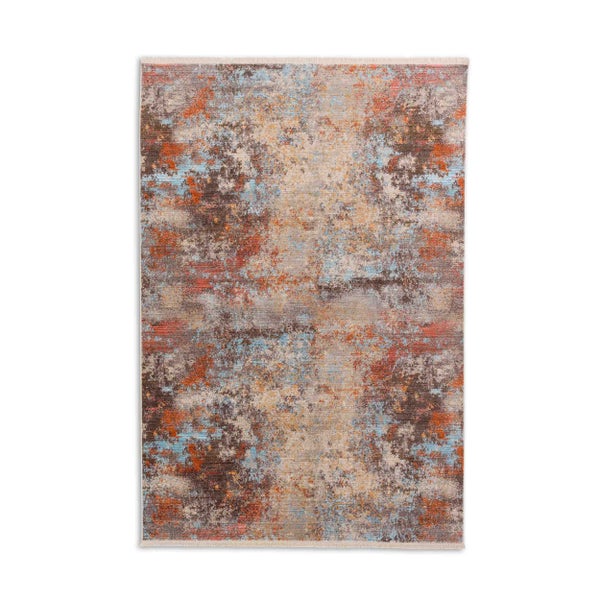 Abstrakter Teppich mit buntem Muster im Vintage Stil und Fransen an den Enden.