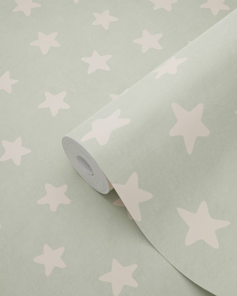 Eine Rolle Tapete mit Sternenmuster.