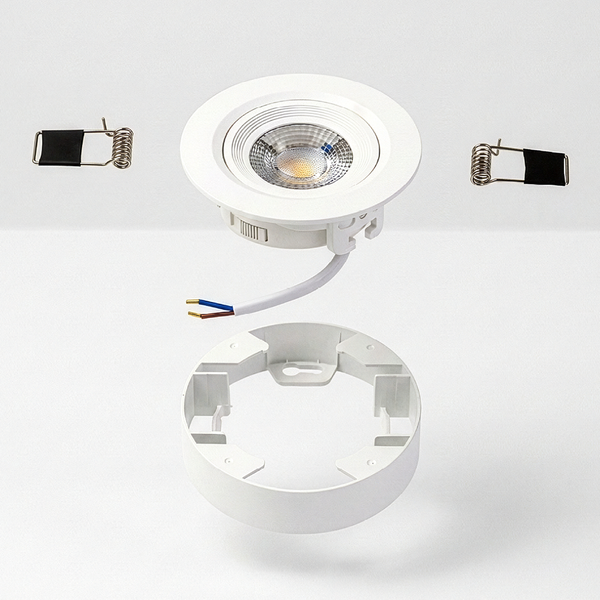 Weiße LED-Einbauleuchte mit Montagerahmen, Anschlusskabel und Federklammern aus Metall.
