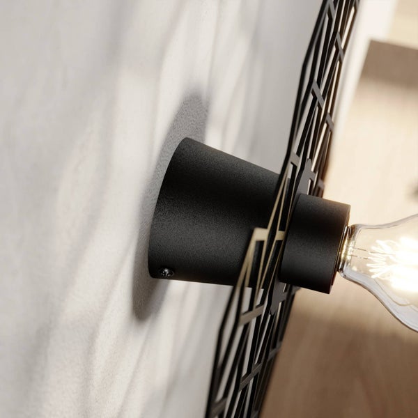Schwarze Wandleuchte mit Gitterdesign und Glühbirne