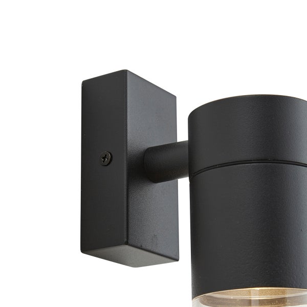 Schwarze zylindrische Außenwandleuchte aus Metall mit rechteckiger Wandhalterung.