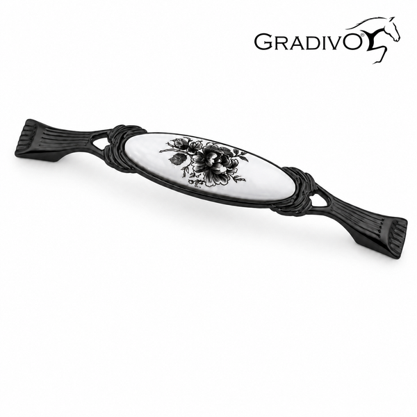 Schwarzer verzierter Möbelgriff aus Metall und weißer Keramik mit Blumenmuster und Gradivo Logo.