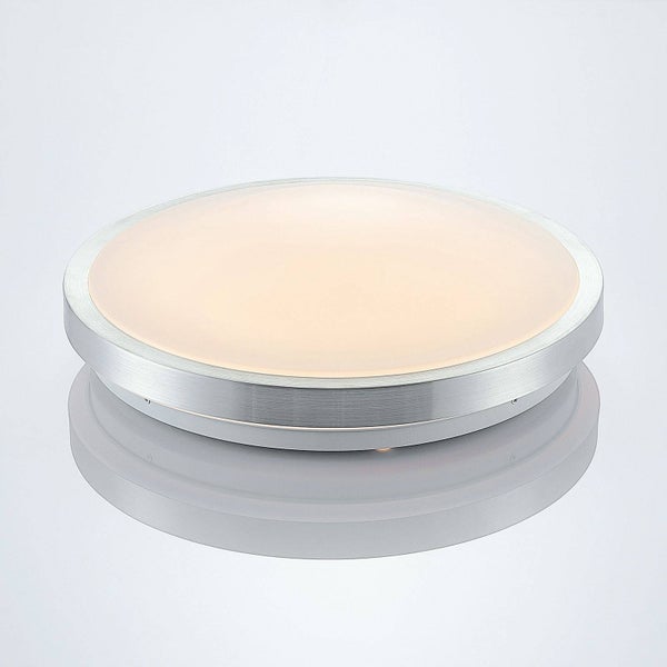 Weißer Schienenstrahler in zylindrischer Form, an einer weißen Deckenleiste montiert und eingeschaltet.