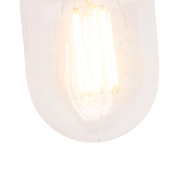 Nahaufnahme eines leuchtenden LED-Leuchtmittels in Filament-Optik mit klarem Glaskolben.