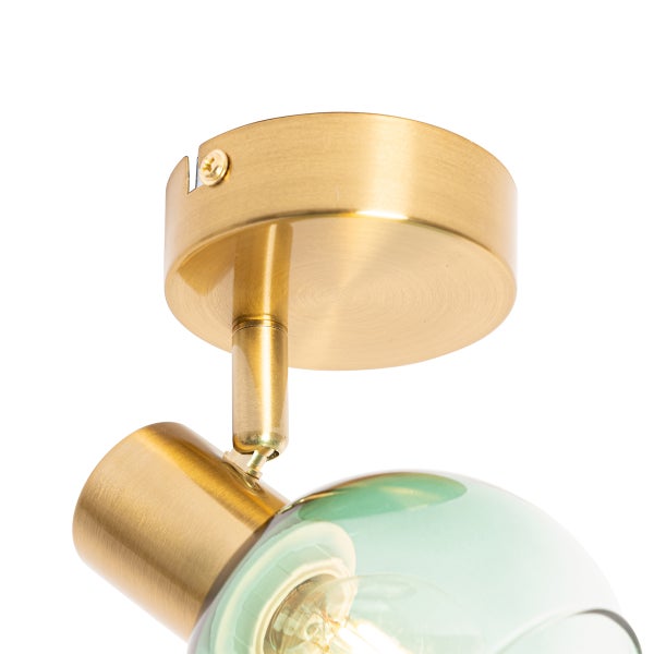 Nahaufnahme einer Deckenleuchte mit Schirm aus Glas und Metall