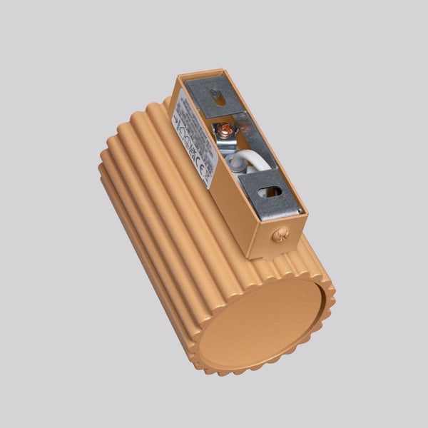 Wandleuchte mit gerippter Oberfläche