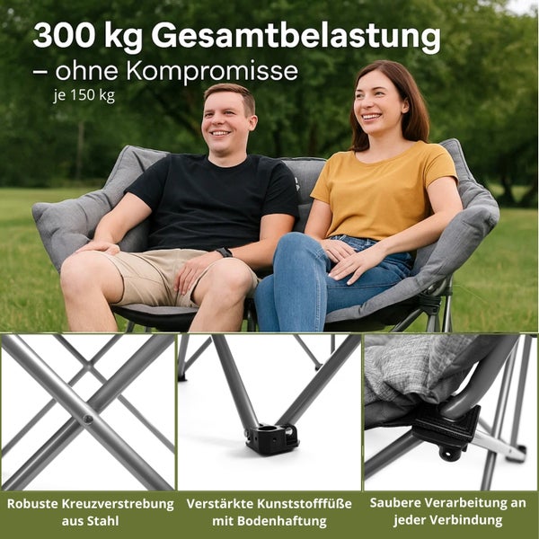 Zwei Personen sitzen auf einem grauen Doppelsessel mit Stahlrahmen und einer maximalen Gesamtbelastung von 300 Kilogramm.