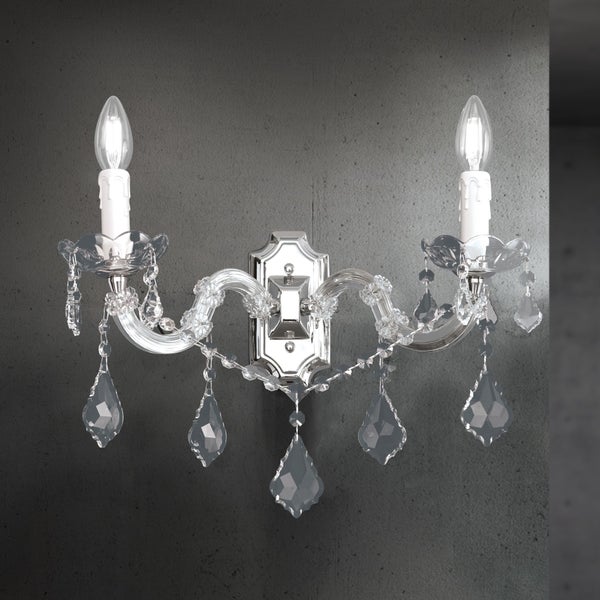 Zweiflammige Wandleuchte im klassischen Stil mit glänzender Metalloberfläche und Kristallbehang als elegante Beleuchtung für den Innenbereich