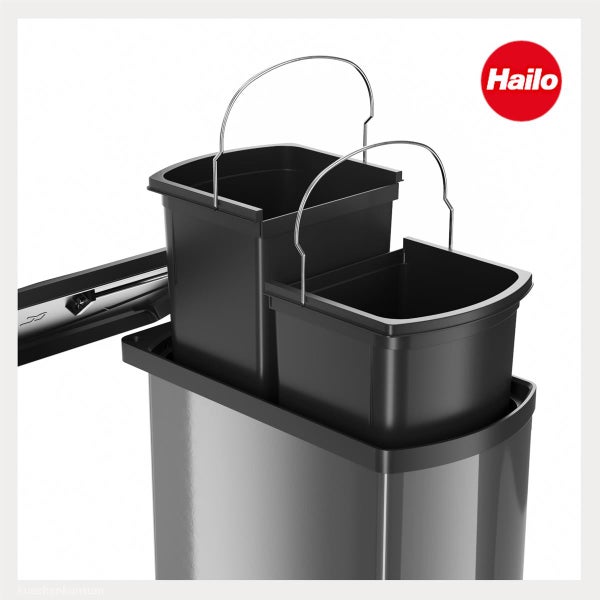 Hailo Logo. Mülltrennsystem mit zwei schwarzen Inneneimern aus Kunststoff und Metalltragegriffen in einem grauen Gehäuse.