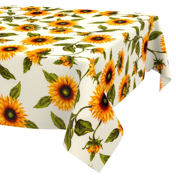 Tischdecke mit Sonnenblumenmuster und grünen Blättern.