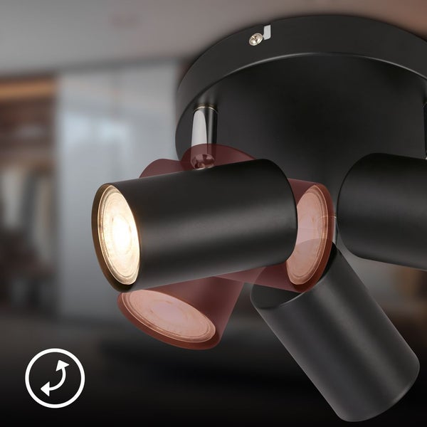 Dreiflammiger Deckenstrahler aus schwarzem Metall mit verstellbaren Spotköpfen.