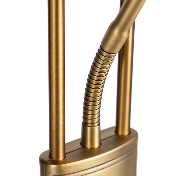 Detailansicht einer Messinglampe mit flexiblem Arm