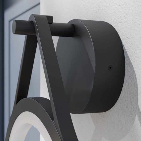Moderne Außenwandleuchte in Schwarz mit runder Wandhalterung und integriertem LED-Ring.