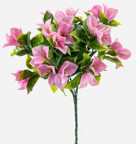 Detailansicht eines grünen strukturierten Stiels einer Kunstblume aus Kunststoff mit rosa Blütenblättern.