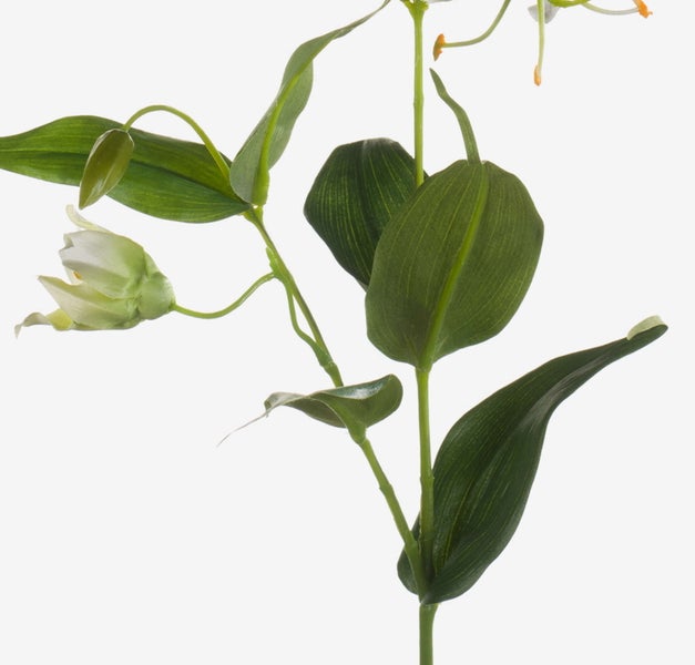 Nahaufnahme eines künstlichen Pflanzenstiels mit naturgetreuer Rindenstruktur und grünen Blättern.