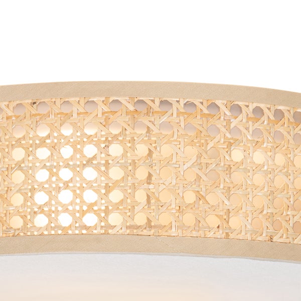 Detailansicht einer Lampe mit Rattanmuster