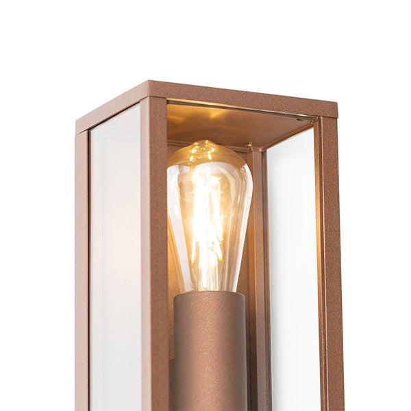 Detailansicht einer Außenleuchte mit Metallrahmen und Glaseinsätzen sowie einem Vintage LED Leuchtmittel.