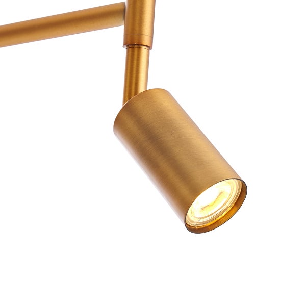 Detailaufnahme einer goldenen Deckenleuchte mit LED Spot