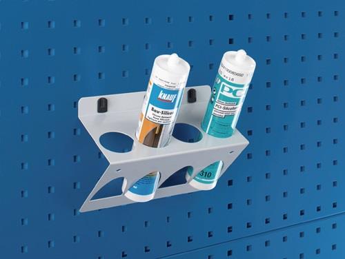 Metallhalterung mit Kartuschen auf Lochwand