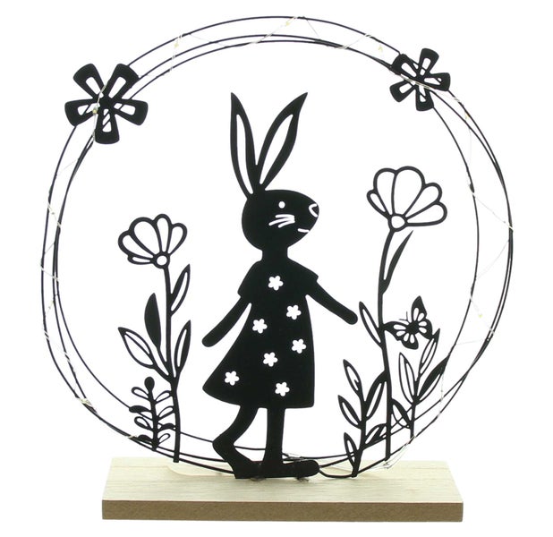 Dekorative Osterfigur: Hasenmädchen Silhouette mit Blumen in einem Kreis mit Lichtern, auf einem Holzsockel