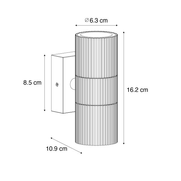 Zylinderförmige Wandleuchte mit geriffelter Oberfläche. Maße: Höhe 16,2 Zentimeter, Durchmesser 6,3 Zentimeter, Tiefe 10,9 Zentimeter.
