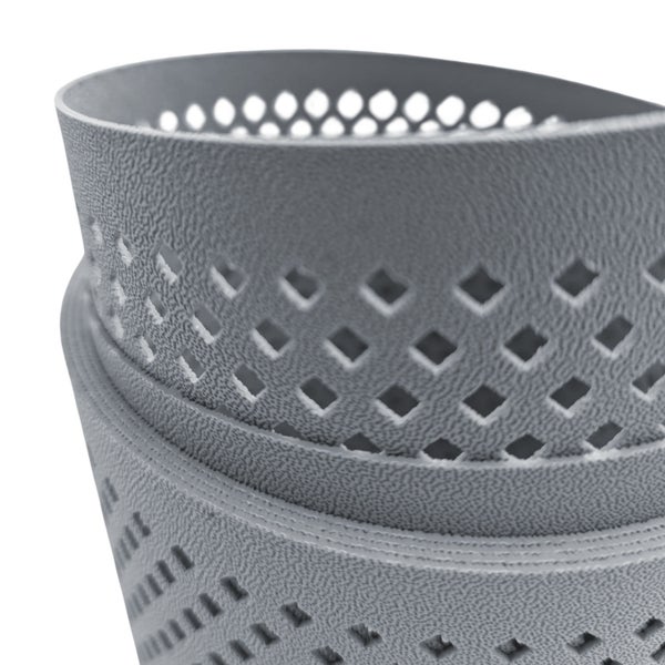 Detailansicht eines Pflanzgefäßes mit Lochmuster