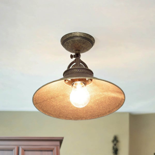 Deckenleuchte mit Lampenschirm an einer Decke