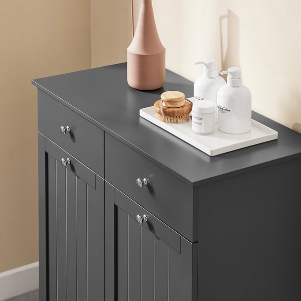 Grauer Badezimmerschrank mit Schubladen und Türen zur Aufbewahrung von Badutensilien