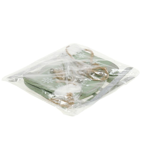 Verpackte Dekoschlitten mit Schneeflockenmuster und Glöckchen