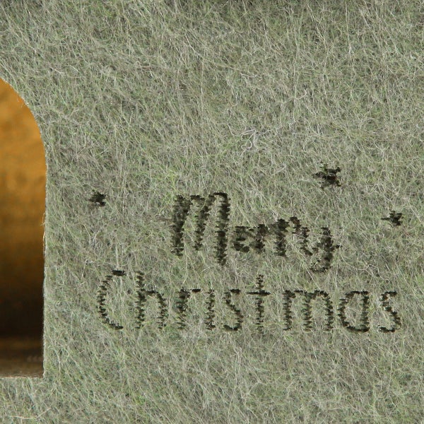 Dekoration mit der Aufschrift Frohe Weihnachten