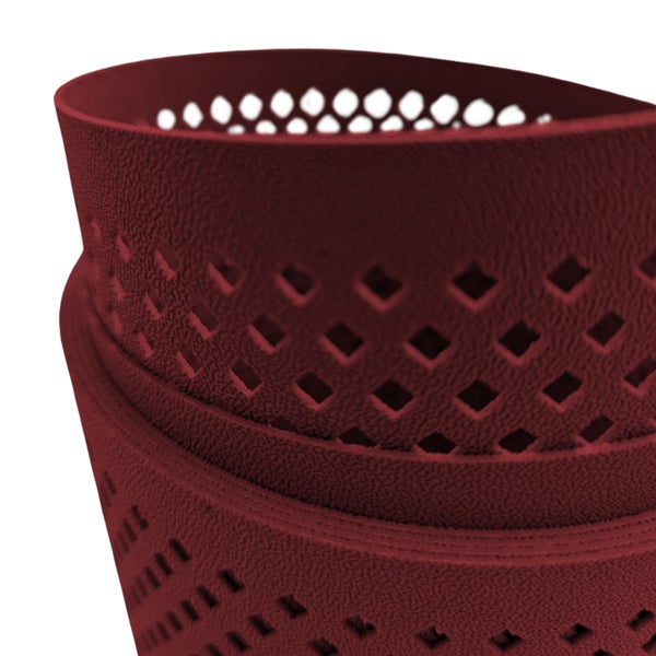 Detailansicht eines Pflanzgefäßes mit Lochmuster