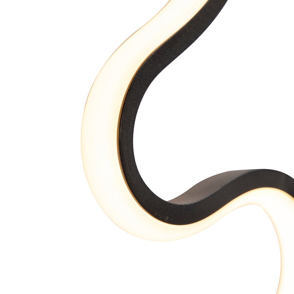 Detailaufnahme einer geschwungenen LED Lampe