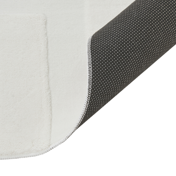 Teppich mit rutschfester Unterseite mit Noppen und weicher Oberflaeche