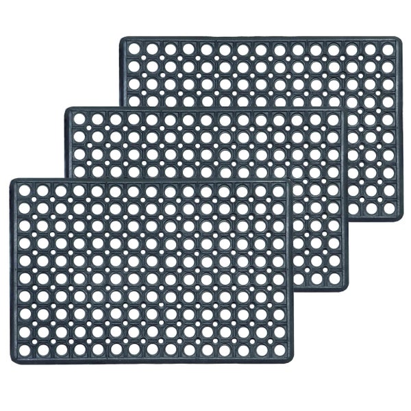 Drei rechteckige Gummi Fußmatten mit Löchern