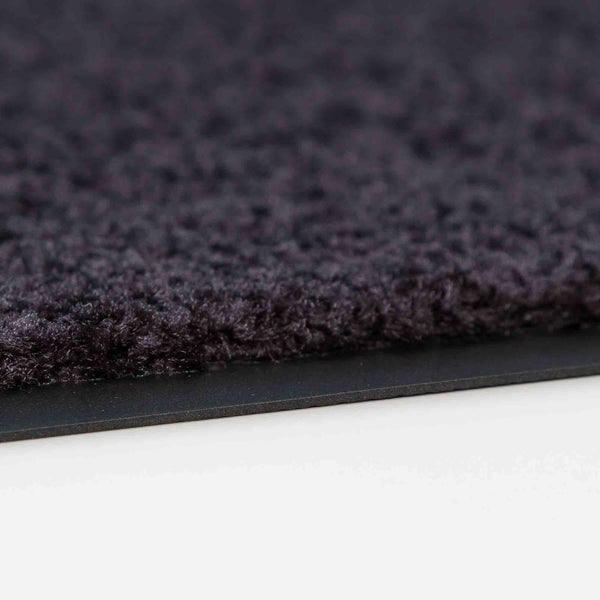 Detailansicht einer Schmutzfangmatte mit Flor und Gummirand