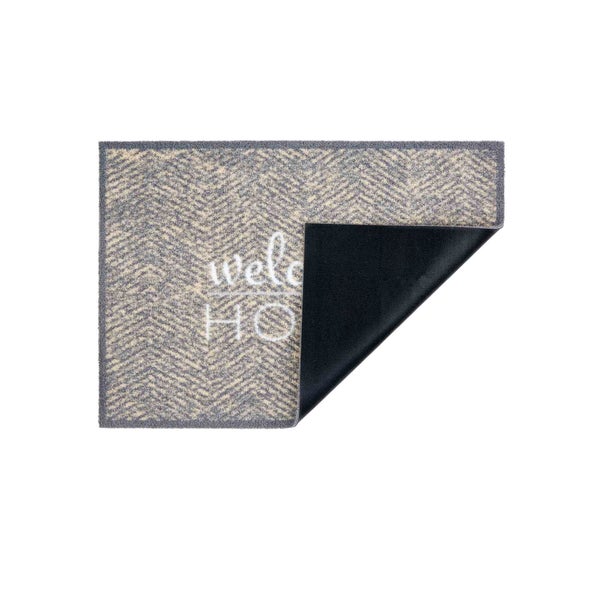 Fußmatte mit Muster und Willkommensgruß